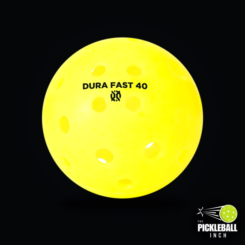 Onix Dura Fast 40 Outdoor Pickleball Ball Lab Test Review on Dark Studio Background