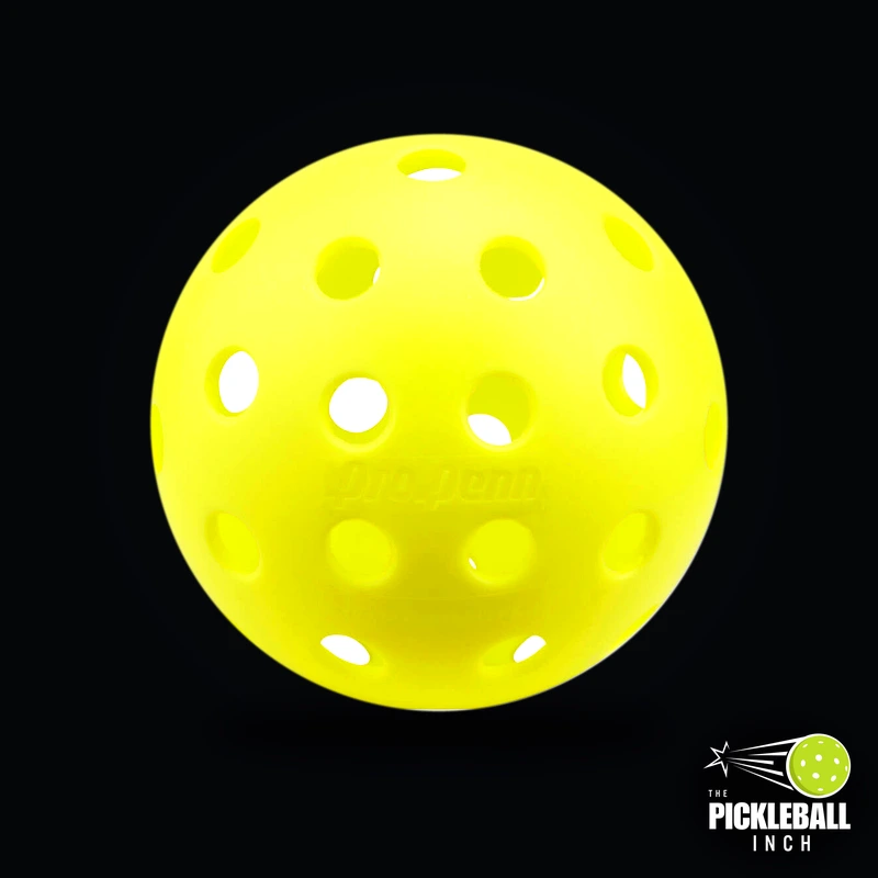 Head Penn 40 Outdoor Pickleball Ball Lab Test Review on Dark Studio Background